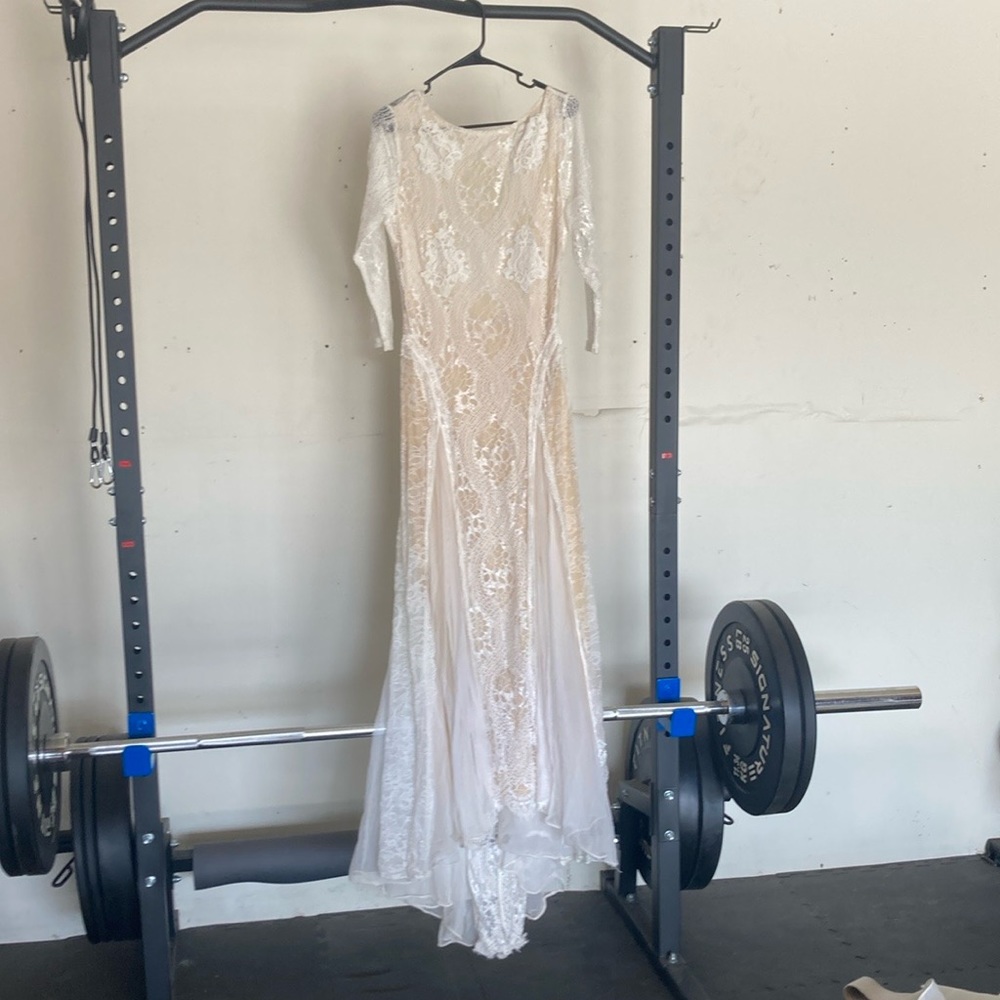 Lace 3/4 sleeve wedding dress with low cut out back